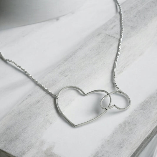 Collier double cœur entrelacés